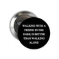 Round black pinback button with white quote text on the front