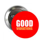 Round pinback badge with red front and white 'GOOD VIBRATIONS' text; silver pin back