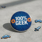 Round blue 2.25-inch pinback button with “100% GEEK” and gear icons