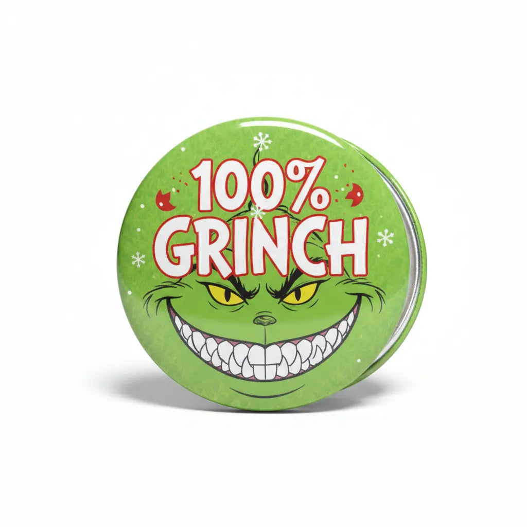 2.25-inch round Grinch pinback button with green face and “100% GRINCH” text