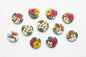 24-pack Luau flower pinback buttons, round 1.25-inch; colorful tropical blooms and leaves