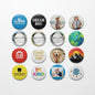 Set of 12 round pinback buttons with colorful printed designs and silver pin backs