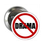 Drama prohibition pinback button, metal backing, red ring with diagonal slash over DRAMA.