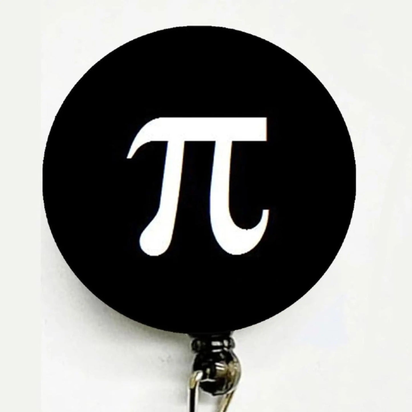 Retractable reel badge with black circle Pi symbol and metal clasp clip