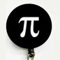 Retractable reel badge with black circle Pi symbol and metal clasp clip