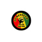 Round Juneteenth button pin with fist icon, “FREE-ISH SINCE 1865” text, red and green