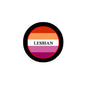 Circular lesbian pride pinback button badge with black rim, rainbow ring, and text LESBIAN