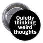 1.25-inch black pinback button with white text: "Quietly thinking weird thoughts"