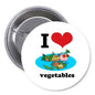Round white pinback button with I heart vegetables text and colorful veggie illustration