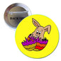 Easter pinback button with cartoon bunny holding a purple egg on a yellow circle
