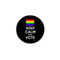 Round black button pin with rainbow flag stripes and KEEP CALM AND VOTE text