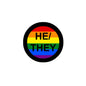 Round pronoun pin with rainbow circle and 'HE'/'THEY' text, black outer ring