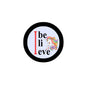 Unicorn pinback button with black border and “I believe” text on a light background