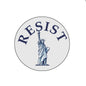 RESIST Statue of Liberty pinback button with blue circular design and 'RESIST' text