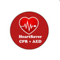 Red circular HeartSaver CPR + AED reel with heart ECG icon