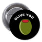 2.25-inch pinback button, black with 'OLIVE YOU' text and green olive graphic