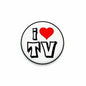 Round TV pinback button badge with red heart and bold black TV lettering