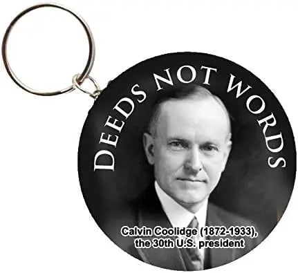 Round photo keychain with black 'DEEDS NOT WORDS' text and Calvin Coolidge portrait