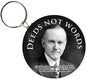 Round photo keychain with black 'DEEDS NOT WORDS' text and Calvin Coolidge portrait