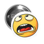 Round pinback button with yellow angry emoji face, black border, silver back