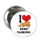2.25-inch circular pinback badge with dog, red heart, and 'ZERO TASKING' text