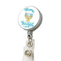 White retractable badge reel with round Happy Hanukkah design and metal clip