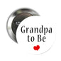 Circular metal button pin with "Grandpa to Be" text and red heart