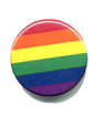 Rainbow Pride button badge with red, orange, yellow, green, blue, and purple stripes