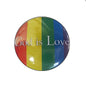 Round pinback badge with rainbow stripes and 'God is Love' text