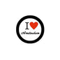 Round pinback badge with black rim, white face, red heart, and 'I ♥ Amsterdam' text
