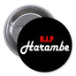 Black pinback button with R.I.P. Harambe text in red and white script