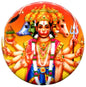 Circular Hanuman pinback badge with colorful deity illustration in red, gold, and green.