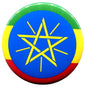 Ethiopia flag pinback button, round blue center with yellow star and green-red border