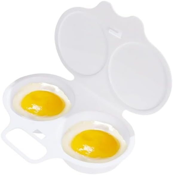 White egg mold with two cracked eggs inside on a white background