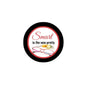 Round black pinback with red center reading “Smart is the new pretty”