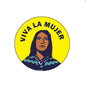 Viva la Mujer round pinback button with illustrated woman and blue text on yellow