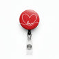 Red heart-shaped felt badge reel with heart outline and 'love' script