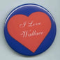 Heart-themed pinback button with red heart and 'I Love Wallace' text on blue border
