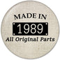 Fabric-textured pinback button: 'MADE IN 1989' and 'All Original Parts'.