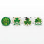 Set of four green St. Patrick's Day pinback buttons with shamrock and 'lucky' designs