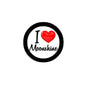 Round pinback badge with black rim, red heart, and “Moonshine” text