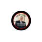 Circular Ted Kennedy pinback button with black border, red ring, and portrait with 1932–2009 text