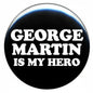 Circular black pinback button with white George Martin is my hero text