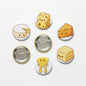 Cheese themed pinback buttons set of 5, circular enamel-style with cute cheese faces