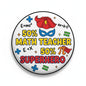 Circular math teacher pinback button with 50% text, red cape, blue superhero mask