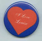 Blue round pinback button with red heart and white "I Love Louie" text