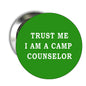 2.25-inch round green pinback button with white text: TRUST ME I AM A CAMP COUNSELOR