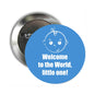 Baby pinback button with blue face graphic and "Welcome to the World, little one!"