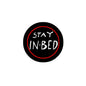 2.25-inch pinback badge with black circle, red ring, and “STAY IN-BED” text