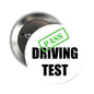 Round silver pinback button for driving test, reads PASS DRIVING TEST with green badge